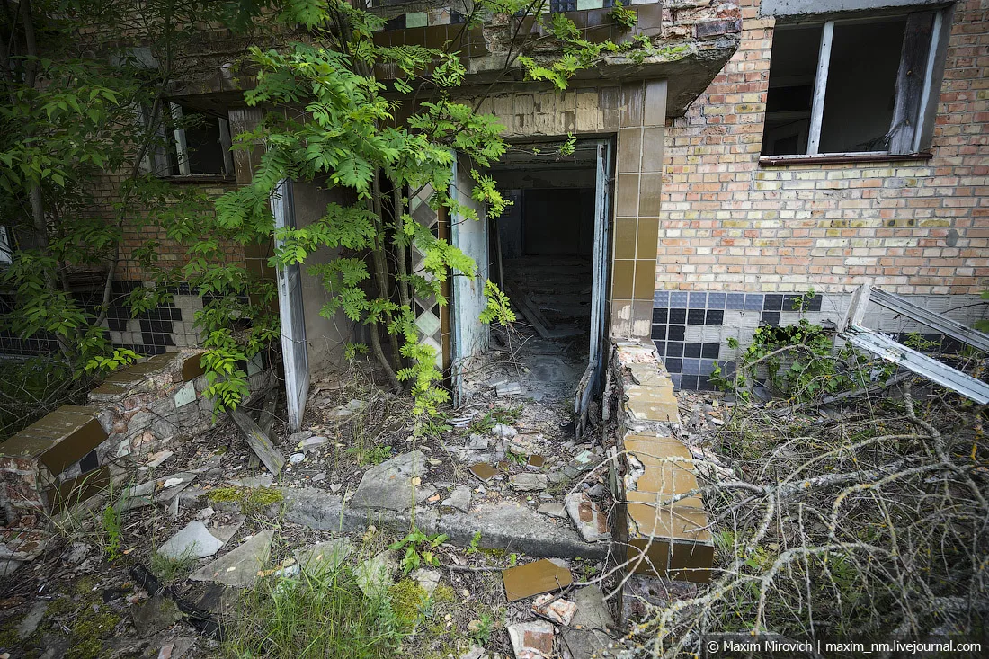 Entrance to the building inside Polysske chernobyl city